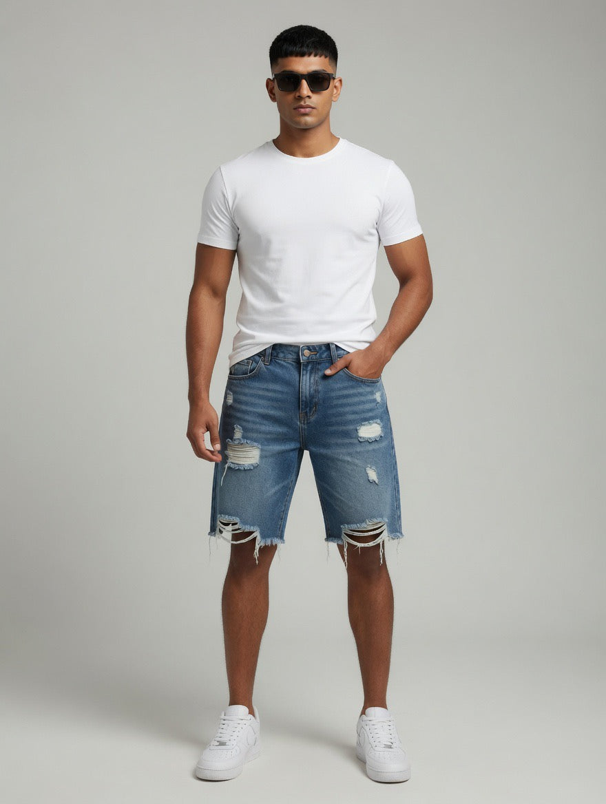 Heavily Distressed Denim Shorts — Light Blue