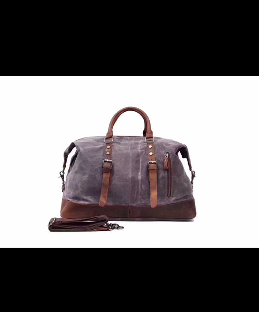 Cow hide leather and canvas duffel bag