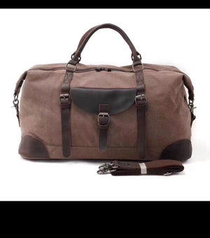 Cow hide leather and canvas duffel bag